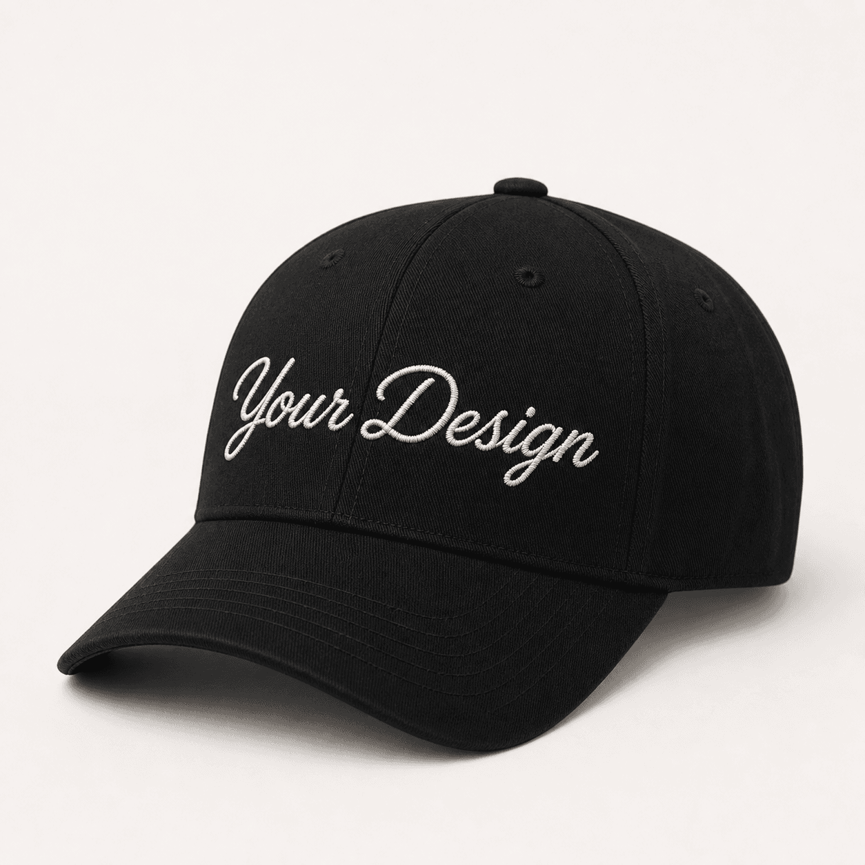 Black structured cap with white script embroidery sample on the front panel