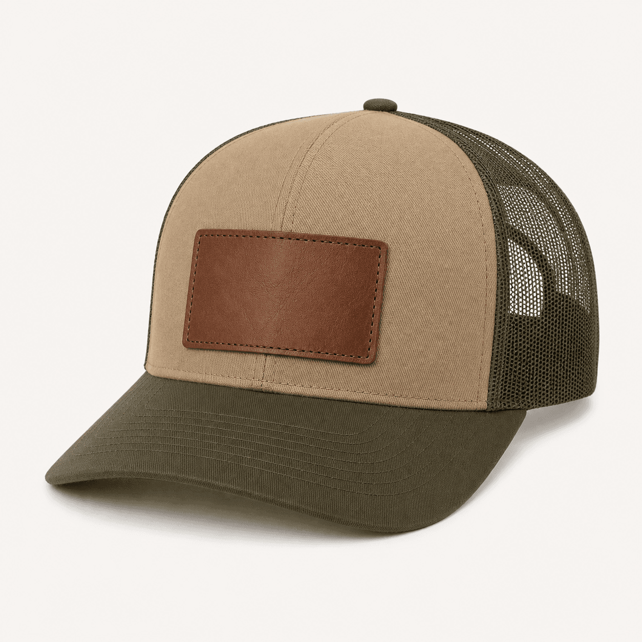 Loden green and khaki blank trucker hat with blank leather patch, front view